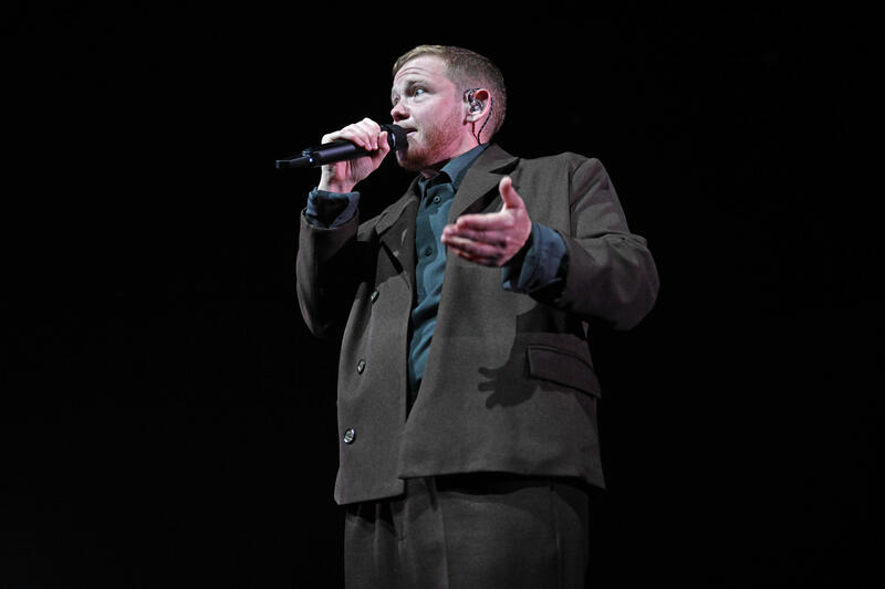 Kae Tempest performing at Brixton Academy