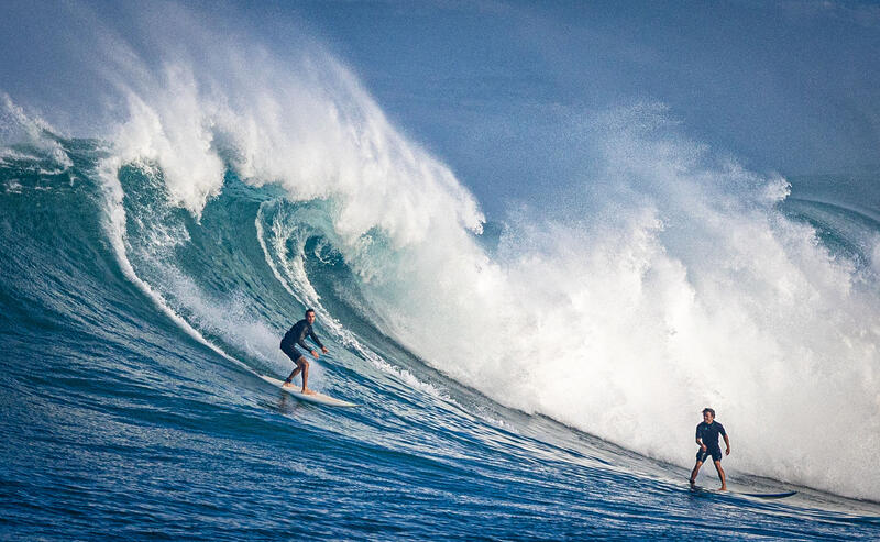 Surfers Surf The XL Swell At Waimea Bay