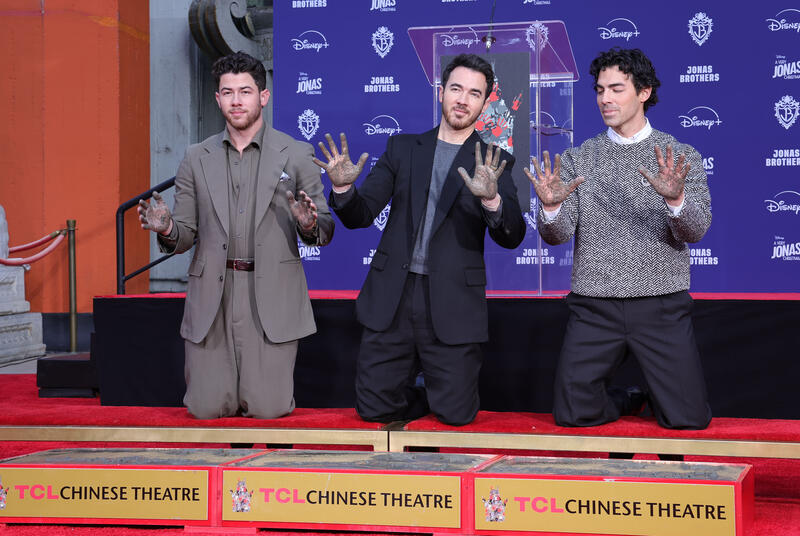 Jonas Brothers Hand And Footprint In Cement Ceremony