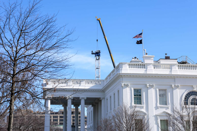 A tower crane is built in the White House Ballroom construction zone where the East wing previously stood at the White House