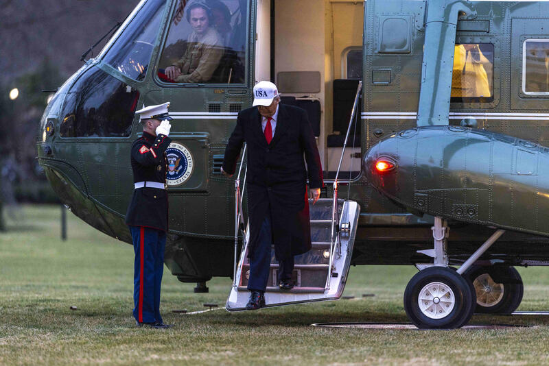 Trump returns to the White House from Detroit, Michgan