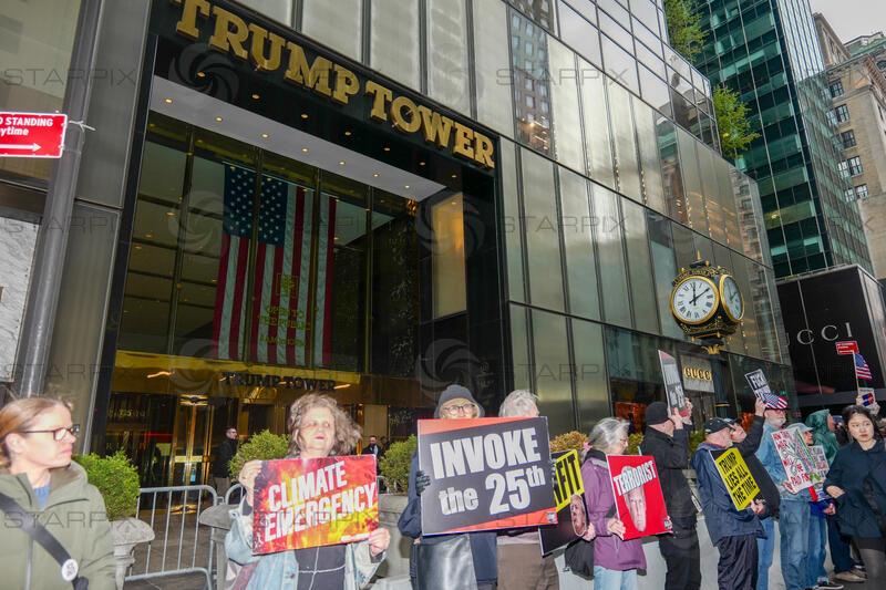 New York, NY- April 19: Rise and Resist “Impeach Convict Remove” Protest in Front of Trump Tower 56th and 5th Ave