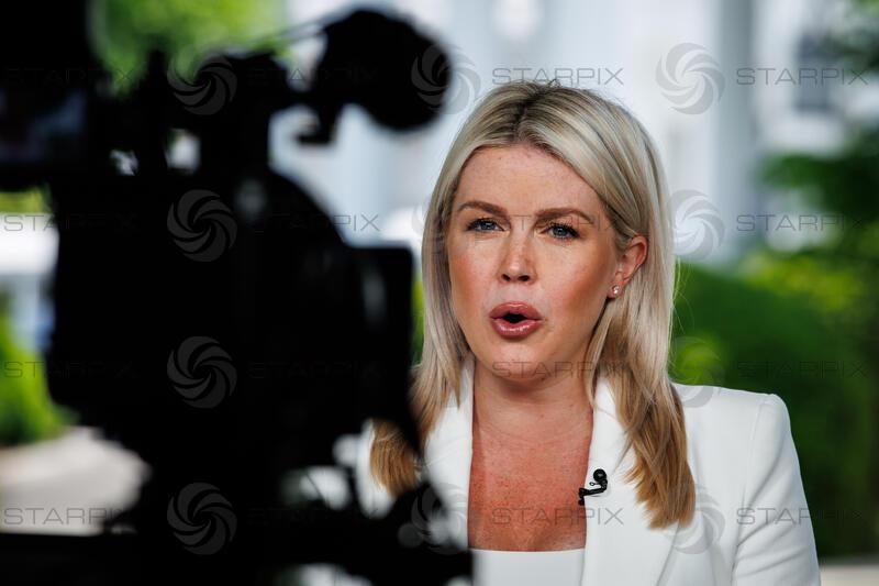 Karoline Leavitt speaks with the press