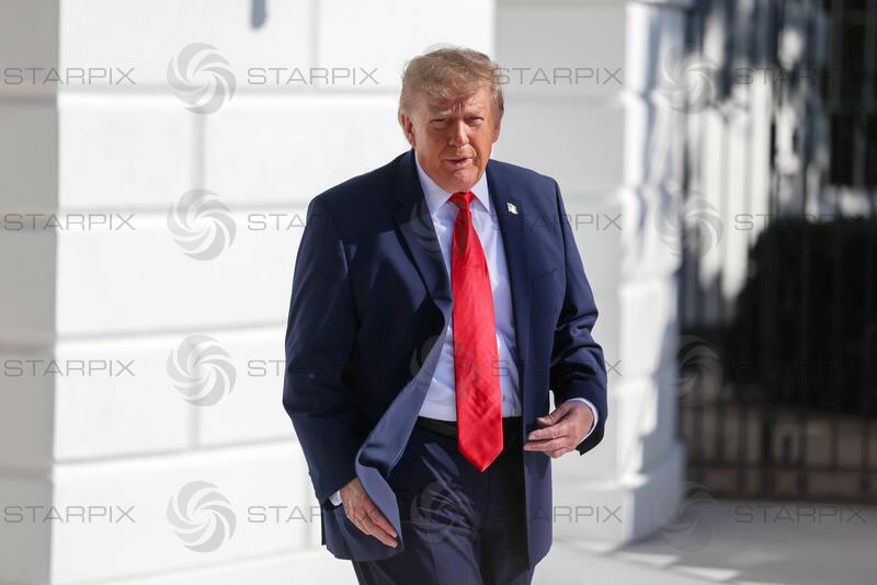 US President Donald Trump speaks to reporters